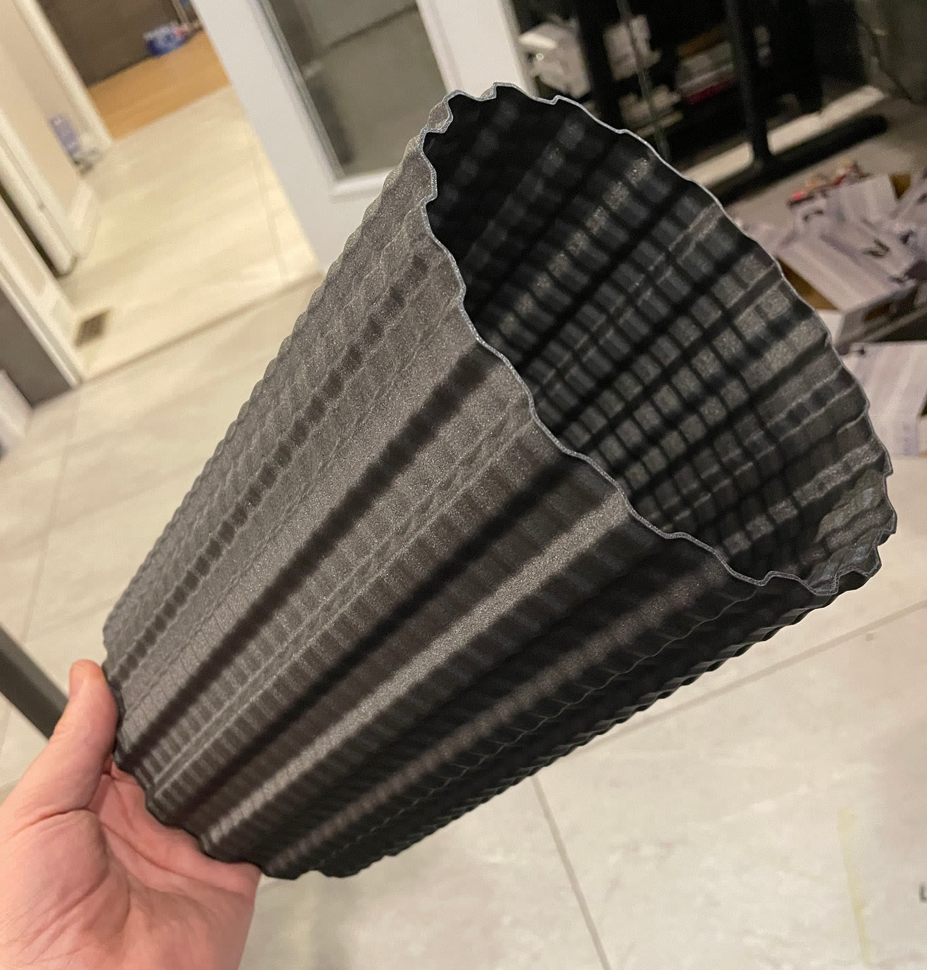 Redesigned printed baffle held in hand
