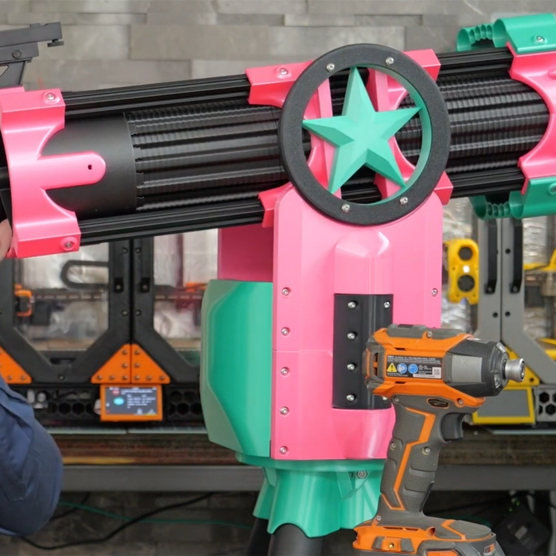 Skyward 150 Compact telescope kit – printed build in pink and teal, side view in the workshop