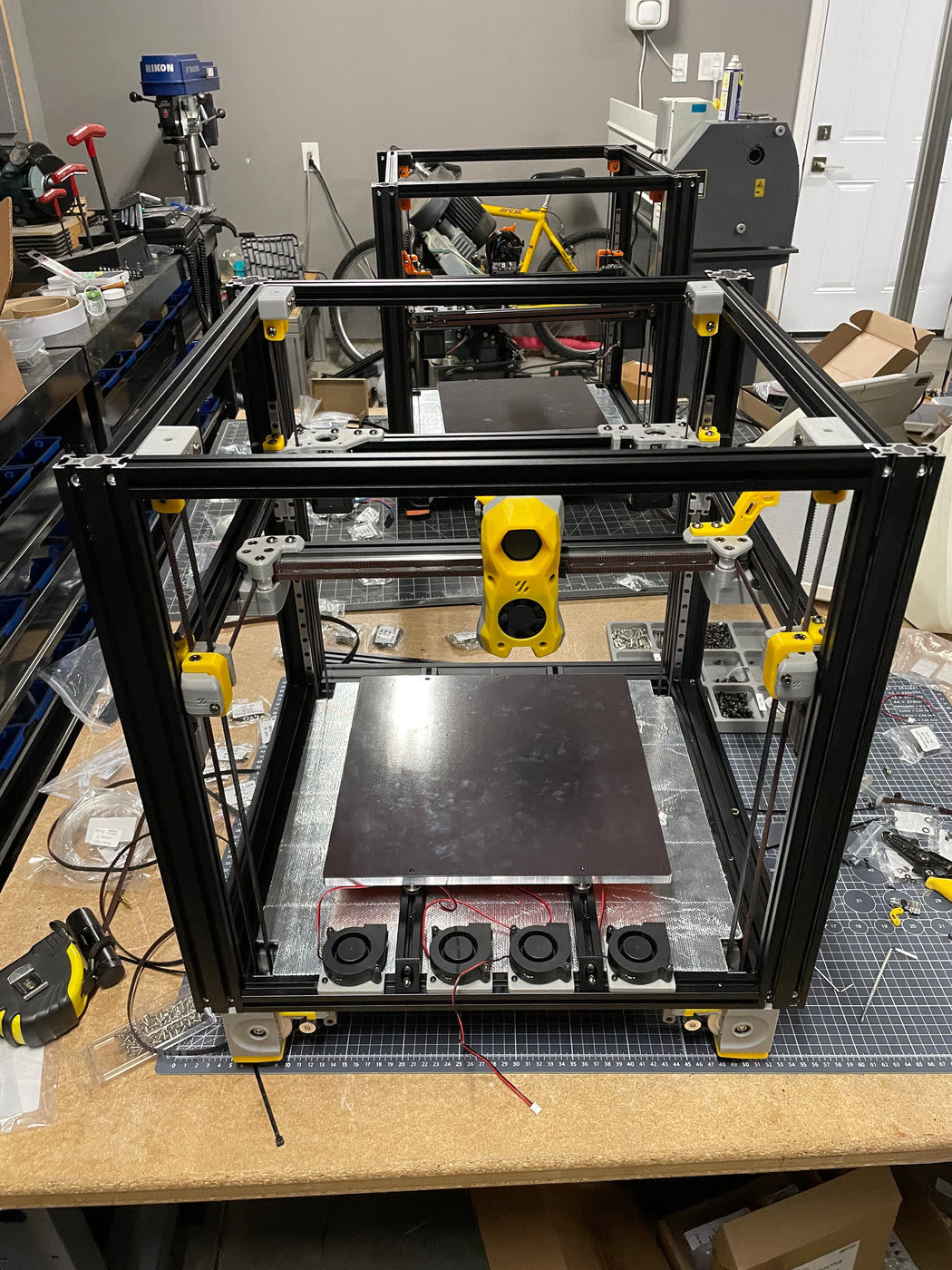 Printer frame with yellow parts under construction