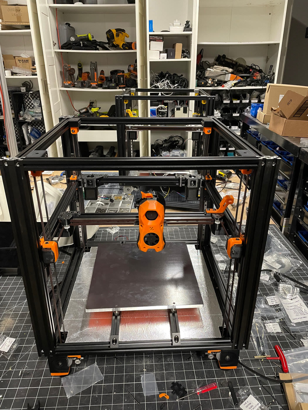 Printer frame with orange parts under construction